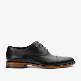 The Gambaha Black Leather Quarter Brogue Cap Toe Oxford Men Shoe Zerogrand Stitchlite Oxford Cole Haan